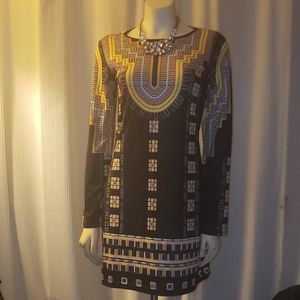 Black long sleeved dress with abstract design